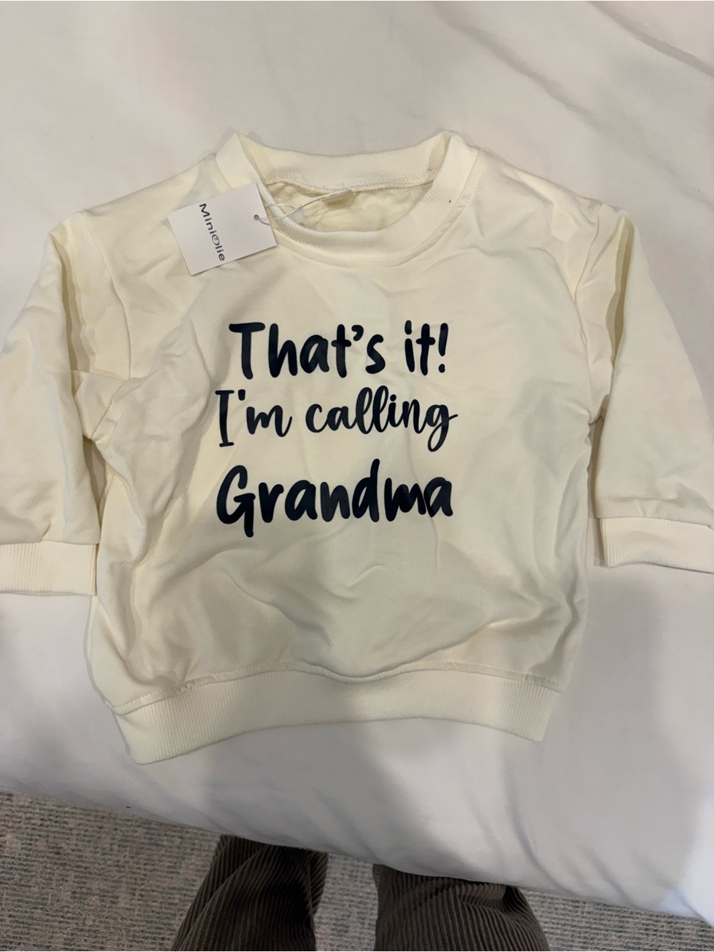 Kids Cream Sweatshirt with black 'That's it! I'm calling Grandma' Text